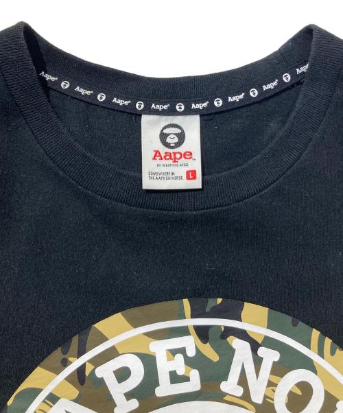 Aape BY A BATHING APE（エーエイプ バイ アベイシングエイプ）Aape BY A BATHING APE (エーエイプ バイ アベイシングエイプ) プリントTシャツ ブラック サイズ:Lの古着・服飾アイテム