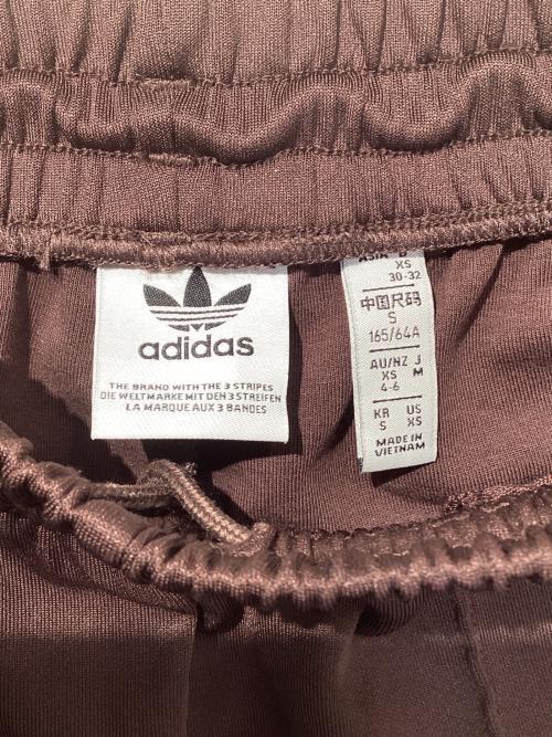 adidas（アディダス）adidas (アディダス) アディカラー クラシックス ワイドレッグパンツ ブラウン サイズ:Mの古着・服飾アイテム