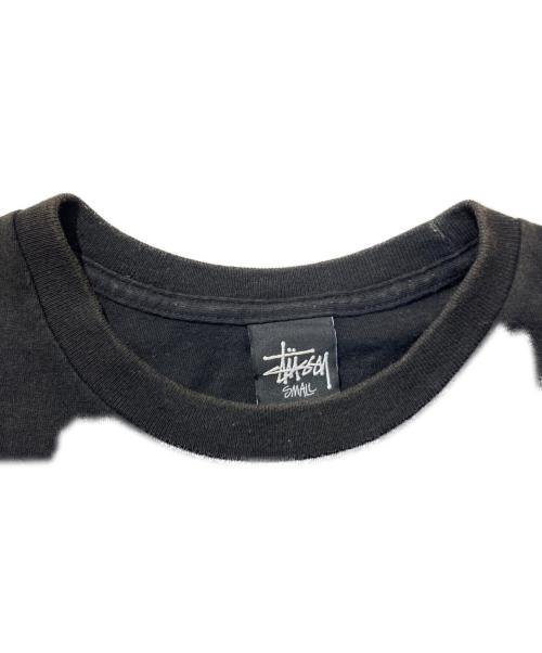 stussy（ステューシー）stussy (ステューシー) GUITAR MANプリントTシャツ ブラック サイズ:Sの古着・服飾アイテム