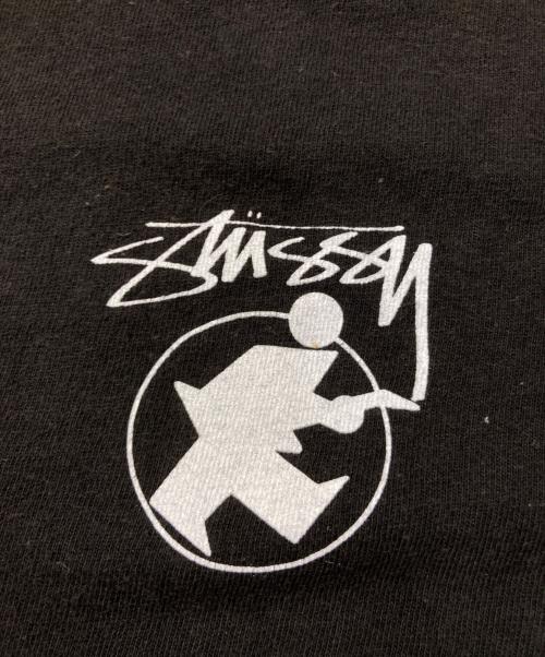 stussy（ステューシー）stussy (ステューシー) GUITAR MANプリントTシャツ ブラック サイズ:Sの古着・服飾アイテム