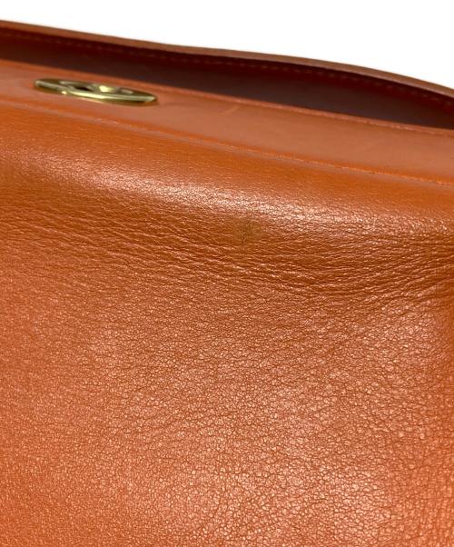 COACH（コーチ）COACH (コーチ) ターンロックワンショルダーバッグ オレンジの古着・服飾アイテム
