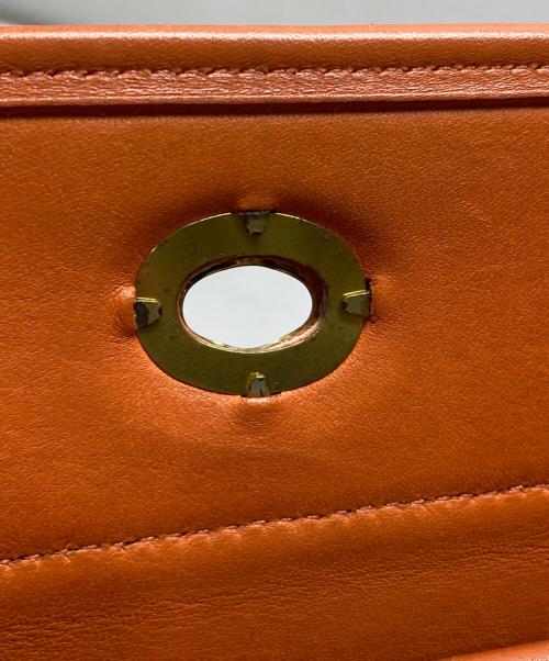 COACH（コーチ）COACH (コーチ) ターンロックワンショルダーバッグ オレンジの古着・服飾アイテム