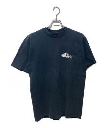 stussy（ステューシー）の古着「Dinosaur T-Shirt」｜ブラック