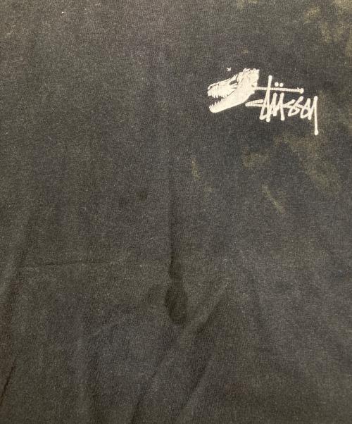 stussy（ステューシー）stussy (ステューシー) Dinosaur T-Shirt ブラック サイズ:Lの古着・服飾アイテム