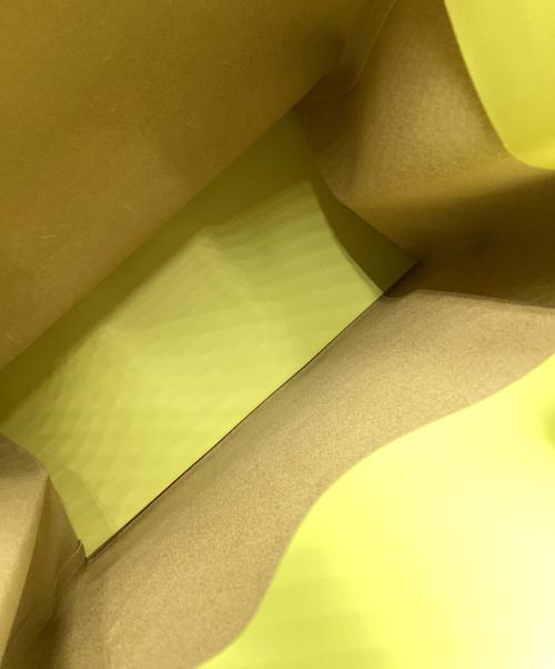 UNKNOWN PRODUCTS（アンノウン プロダクツ）UNKNOWN PRODUCTS (アンノウン プロダクツ) Leather Paper Bag M イエローの古着・服飾アイテム