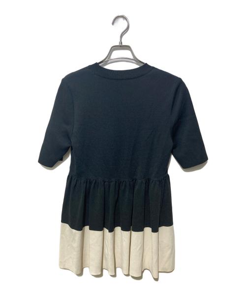 ADORE（アドーア）ADORE (アドーア) ドライストレッチペプラムニットトップス ホワイト×ブラック サイズ:SIZE38の古着・服飾アイテム