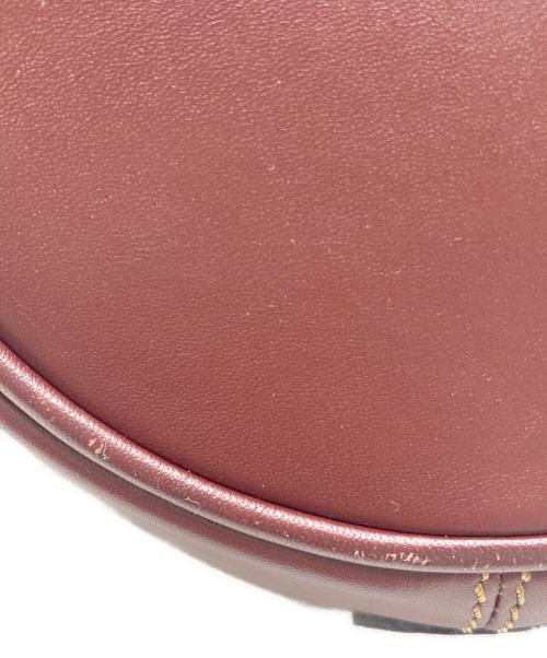 must de cartier（マストドゥカルティエ）must de cartier (マストドゥカルティエ) トートバッグ ワインレッドの古着・服飾アイテム