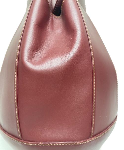 must de cartier（マストドゥカルティエ）must de cartier (マストドゥカルティエ) トートバッグ ワインレッドの古着・服飾アイテム