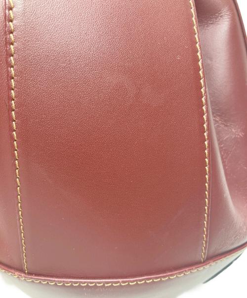 must de cartier（マストドゥカルティエ）must de cartier (マストドゥカルティエ) トートバッグ ワインレッドの古着・服飾アイテム
