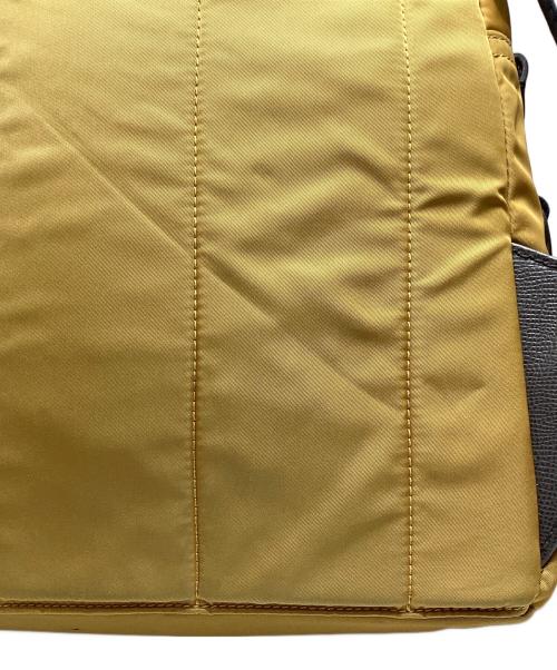DOLCE & GABBANA（ドルチェ＆ガッバーナ）DOLCE & GABBANA (ドルチェ＆ガッバーナ) ワッペンナイロンリュック ベージュの古着・服飾アイテム