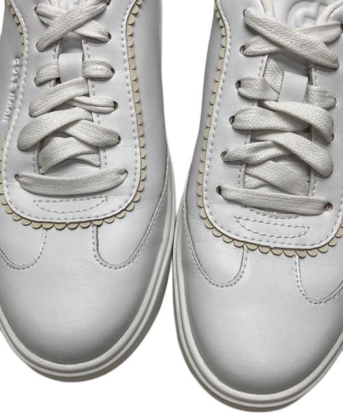 COLE HAAN（コールハーン）COLE HAAN (コールハーン) グランド クロスコート アロウ スニーカー ホワイト サイズ:7Bの古着・服飾アイテム