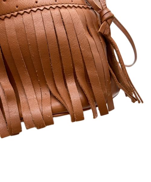 J&M DAVIDSON（ジェイ＆エム デヴィッドソン）J&M DAVIDSON (ジェイ＆エム デヴィッドソン) フリンジカーニバル フリンジレザー巾着バッグ ブラウンの古着・服飾アイテム