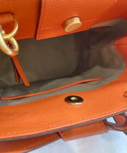 ostkaka（オストカーカ）ostkaka (オストカーカ) バッグ オレンジの古着・服飾アイテム