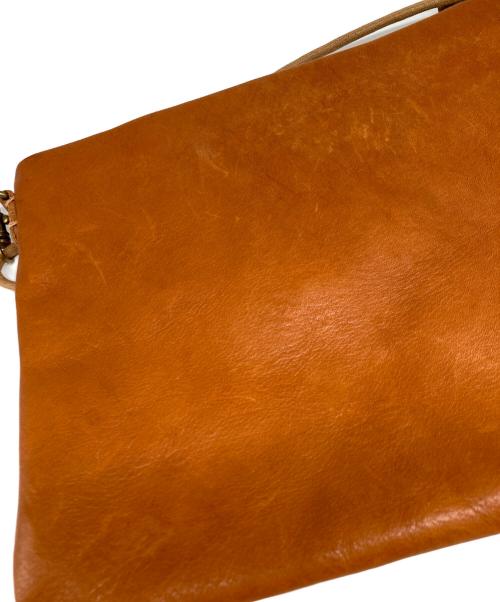 SLOW（スロウ）SLOW (スロウ) レザーサコッシュ ブラウンの古着・服飾アイテム