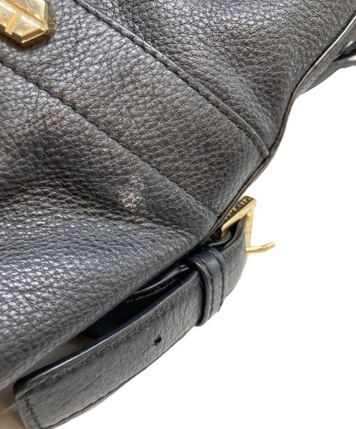 TORY BURCH（トリーバーチ）TORY BURCH (トリーバーチ) レザータッセルリュック ブラックの古着・服飾アイテム