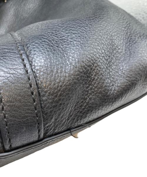 TORY BURCH（トリーバーチ）TORY BURCH (トリーバーチ) レザータッセルリュック ブラックの古着・服飾アイテム