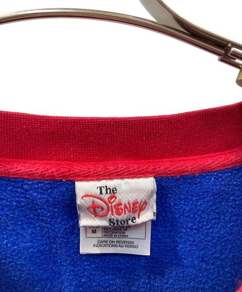 Disney STORE（ディズニーストア）Disney STORE (ディズニーストア) 刺繍ロゴクルーネックスウェット レッド×ブルー サイズ:Lの古着・服飾アイテム