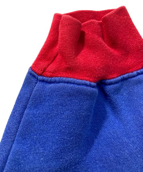 Disney STORE（ディズニーストア）Disney STORE (ディズニーストア) 刺繍ロゴクルーネックスウェット レッド×ブルー サイズ:Lの古着・服飾アイテム