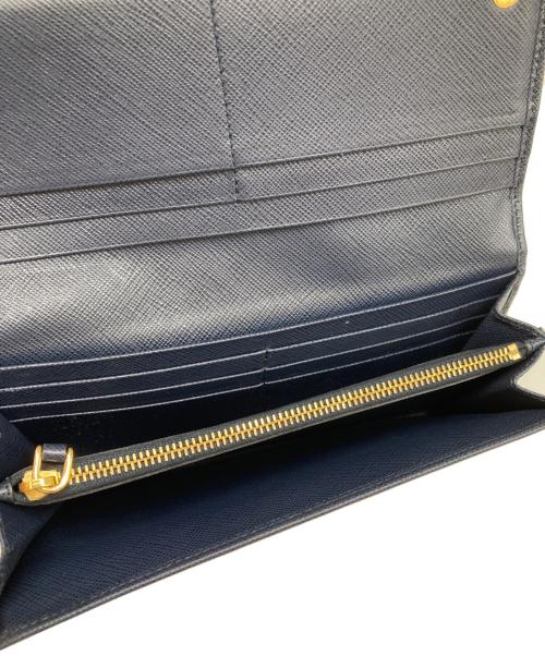 PRADA（プラダ）PRADA (プラダ) サフィアーノ フラップロングウォレット ネイビーの古着・服飾アイテム