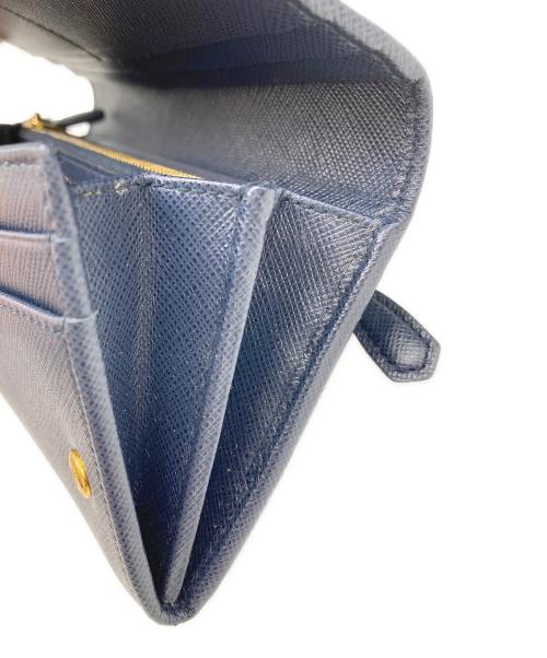 PRADA（プラダ）PRADA (プラダ) サフィアーノ フラップロングウォレット ネイビーの古着・服飾アイテム