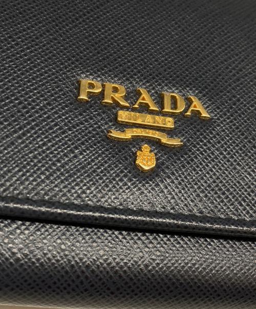 PRADA（プラダ）PRADA (プラダ) サフィアーノ フラップロングウォレット ネイビーの古着・服飾アイテム