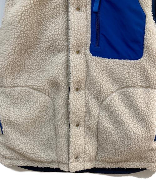 Patagonia（パタゴニア）Patagonia (パタゴニア) メンズ・リバーシブル・ビビー・ダウン・ベスト ブルー×ベージュ サイズ:Mの古着・服飾アイテム