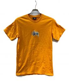 stussy（ステューシー）の古着「Prism Logo T-Shirt」｜オレンジ