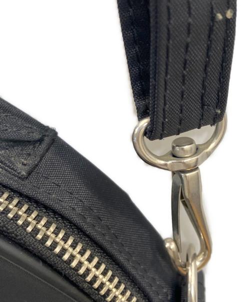 COMME des GARCONS（コムデギャルソン）COMME des GARCONS (コムデギャルソン) TINY BAG ラウンドショルダーバッグ ブラックの古着・服飾アイテム