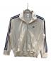 adidas（アディダス）の古着「U FIREBIRD TT」｜ベージュ