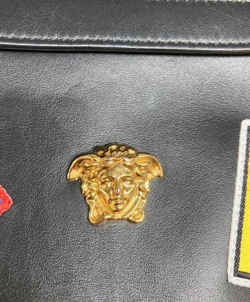 VERSACE（ヴェルサーチェ）VERSACE (ヴェルサーチェ) パッチレザーリュック ブラックの古着・服飾アイテム