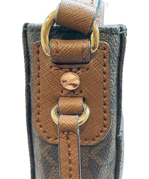 MICHAEL KORS（マイケルコース）MICHAEL KORS (マイケルコース) ジェット セット トラベル シグネチャー ラージ メッセンジャー ブラウンの古着・服飾アイテム