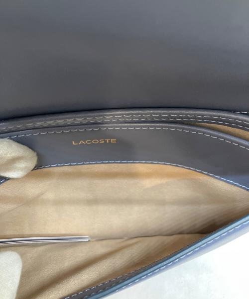 LACOSTE（ラコステ）LACOSTE (ラコステ) テニスボールモチーフフラップバッグ ブルーの古着・服飾アイテム