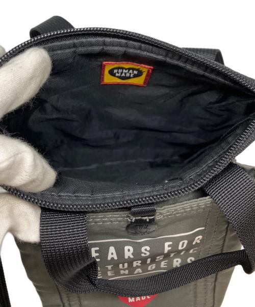 HUMAN MADE（ヒューマンメイド）HUMAN MADE (ヒューマンメイド) MINI HELMET BAG ブラック×オリーブの古着・服飾アイテム