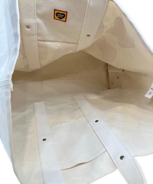 HUMAN MADE（ヒューマンメイド）HUMAN MADE (ヒューマンメイド) KAWS (カウズ) 21AW Made Tote Bag large アイボリーの古着・服飾アイテム