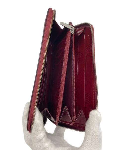 Cartier（カルティエ）Cartier (カルティエ) パテントファスナーウォレット レッドの古着・服飾アイテム