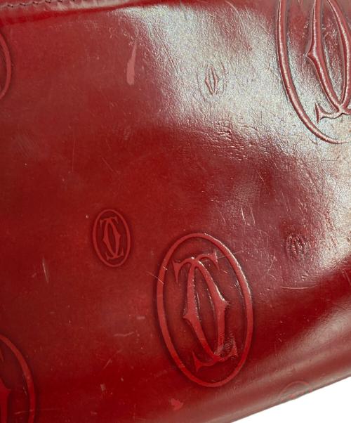 Cartier（カルティエ）Cartier (カルティエ) パテントファスナーウォレット レッドの古着・服飾アイテム