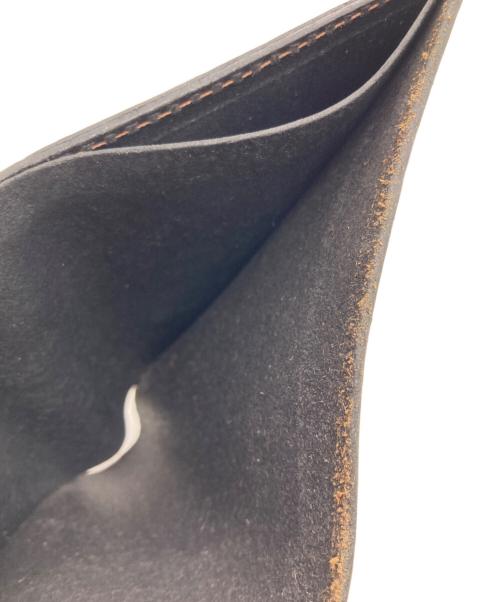 VINTAGE WORKS（ヴィンテージワークス）VINTAGE WORKS (ヴィンテージワークス) 2つ折り財布 ブラックの古着・服飾アイテム