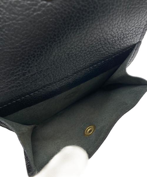 IL BISONTE（イル ビゾンテ）IL BISONTE (イル ビゾンテ) レザーフラップ二つ折りウォレット ブラックの古着・服飾アイテム