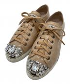 MIU MIUミュウミュウ）の古着「パテントレザービジュースニーカー」｜ベージュ