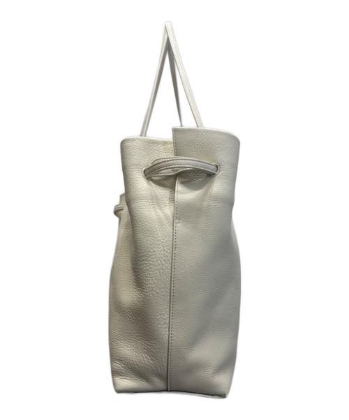 MARY AL TERNA（メアリオルターナ）MARY AL TERNA (メアリオルターナ) WRAPPING トートバッグ アイボリーの古着・服飾アイテム