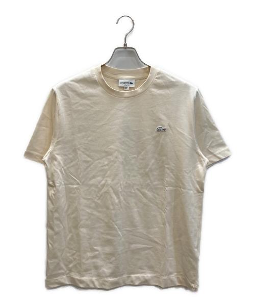 LACOSTE（ラコステ）LACOSTE (ラコステ) アウトライン クロック クルーネック Tシャツ ベージュ サイズ:SIZE M 未使用品の古着・服飾アイテム