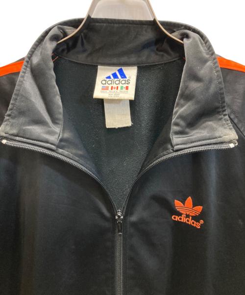 adidas（アディダス）adidas (アディダス) トラックジャケット ブラック×オレンジ サイズ:Mの古着・服飾アイテム