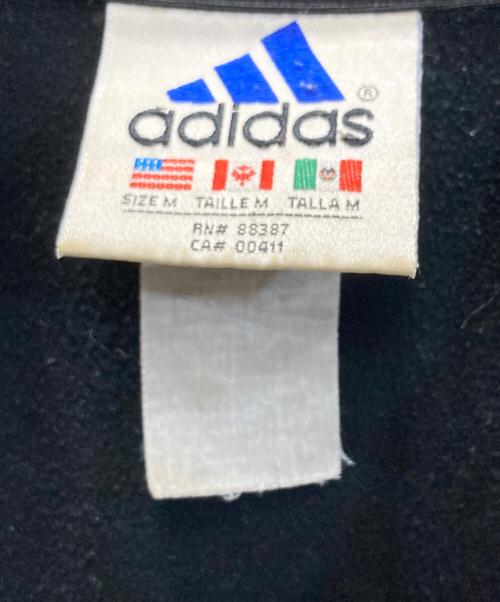 adidas（アディダス）adidas (アディダス) トラックジャケット ブラック×オレンジ サイズ:Mの古着・服飾アイテム