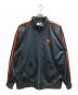 adidas（アディダス）の古着「トラックジャケット」｜ブラック×オレンジ