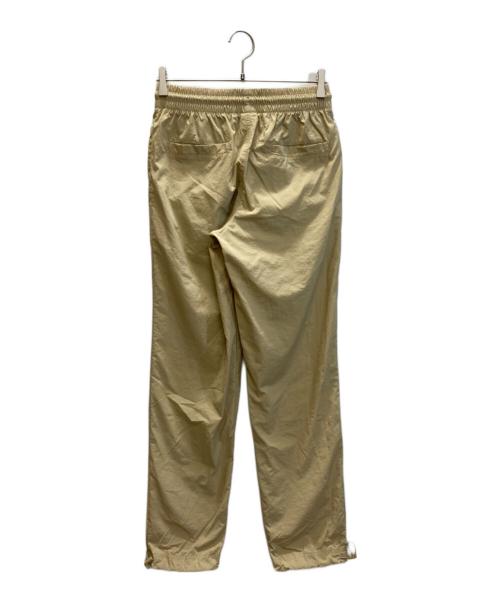 NEW BALANCE（ニューバランス）NEW BALANCE (ニューバランス) Shohei Signature Woven Nylon Pant / ショウヘイ シグネチャー ウーブン ナイロン パンツ ベージュ サイズ:SIZE XSの古着・服飾アイテム