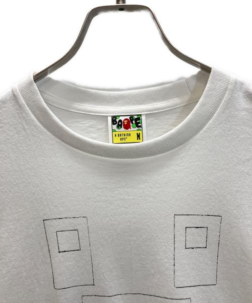 A BATHING APE（アベイシングエイプ）A BATHING APE (アベイシングエイプ) Adam Lister プリントTシャツ ホワイト サイズ:Mの古着・服飾アイテム