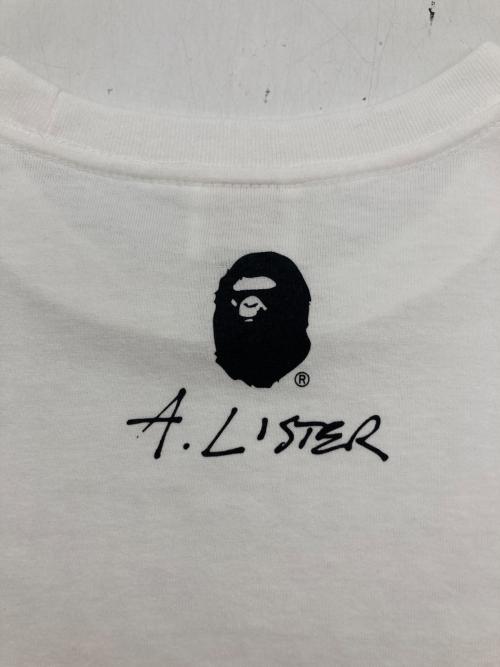 A BATHING APE（アベイシングエイプ）A BATHING APE (アベイシングエイプ) Adam Lister プリントTシャツ ホワイト サイズ:Mの古着・服飾アイテム