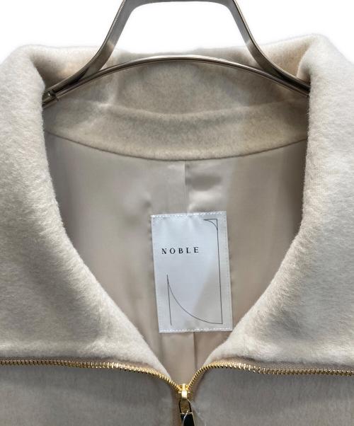 Noble（ノーブル）Noble (ノーブル) キャメルミックスリバージップコート アイボリー サイズ:SIZE 38 未使用品の古着・服飾アイテム