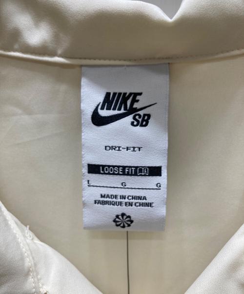 NIKE SB（ナイキエスビー）NIKE SB (ナイキエスビー) LOOSE FIT バックプリント S/S シャツ イエロー サイズ:L 未使用品の古着・服飾アイテム