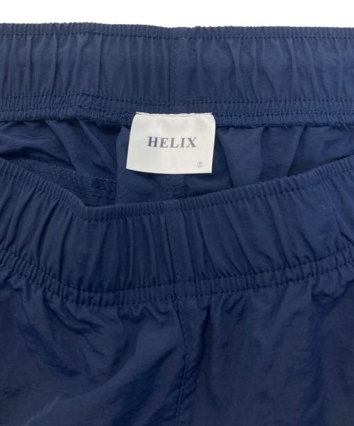 HELIX（ヘリックス）HELIX (ヘリックス) LOGO CHARM NYLON PANTS ネイビー サイズ:SIZE Sの古着・服飾アイテム